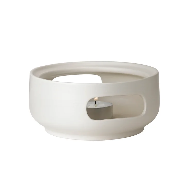 Theo Stövchen von Stelton in sand	