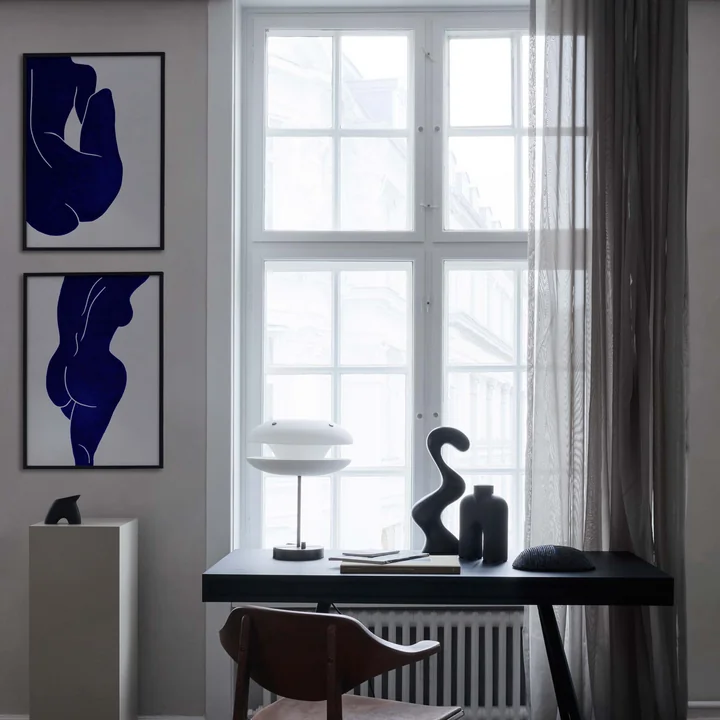 Die verschiedenen Linocut Poster von Paper Collective übereinander
