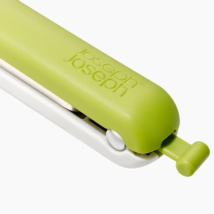 Joseph Joseph - Tweezy 2-in-1 Entkerner, stone / green